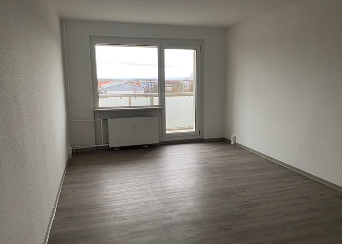sanierte Wohnung mit Badewanne und Blick über Oschersleben: Wohnzimmer