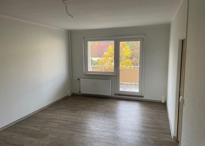 Wohnzimmer mit Balkon