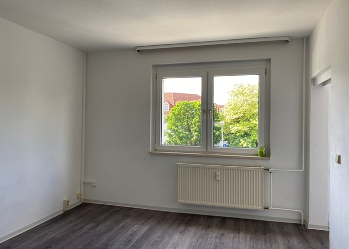 Sanierte Single-Wohnung im 1. Obergeschoss!: Wohnzimmer